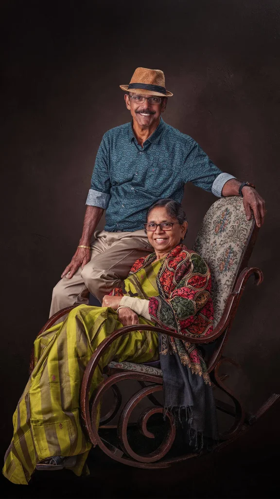 Senior couple seated in a classic studio portrait in Christchurch