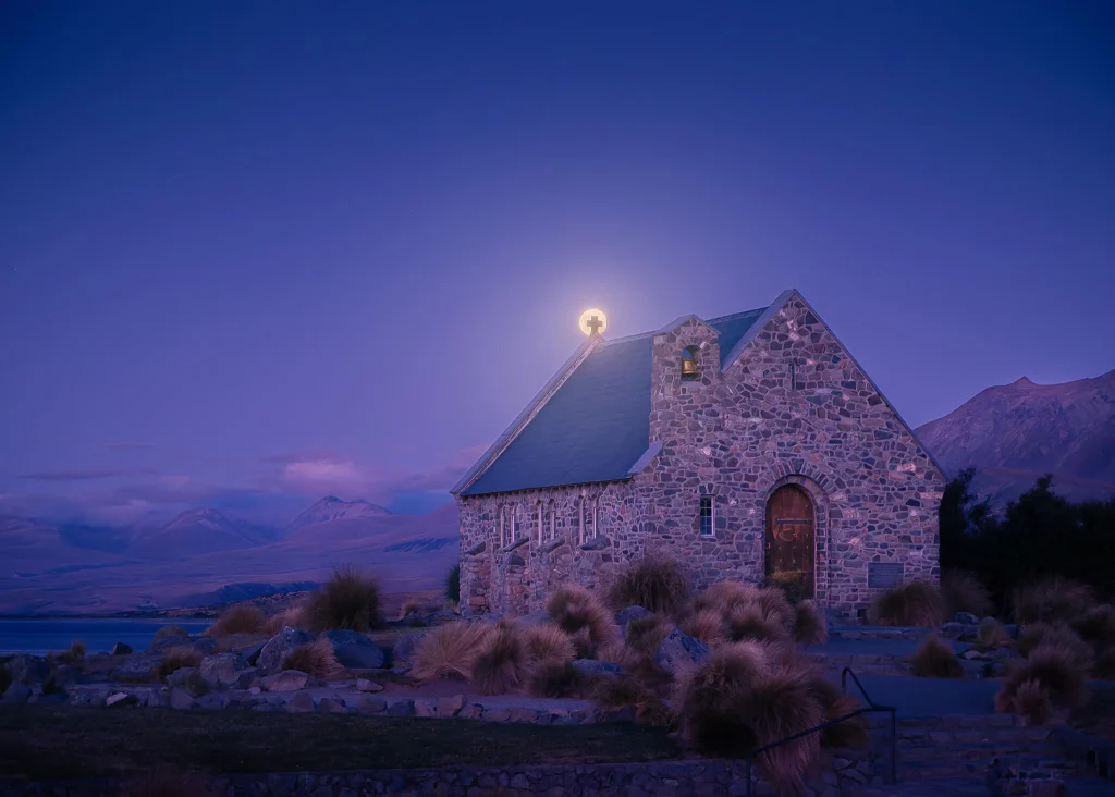 Church of the Good Shepherd with glowing moon at Lake Tekapo, New Zealand