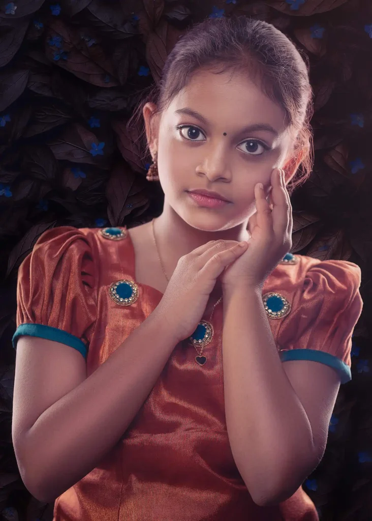 Studio portrait of young Indian girl in traditional outfit with soft lighting in Christchurch